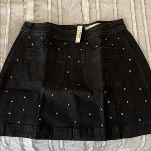 Denim skirt with star embellishments